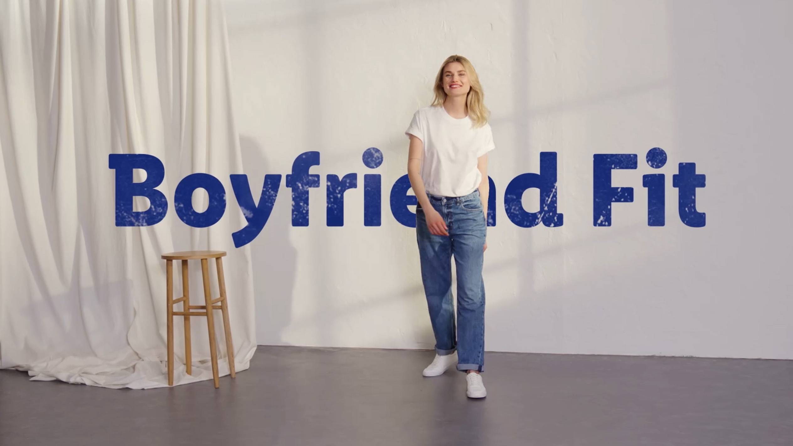 Model in boyfriend fit jeans.