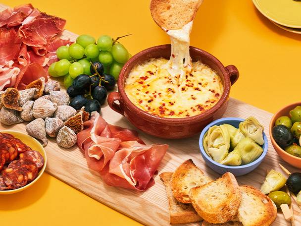 Cheese, ham, olives, grapes