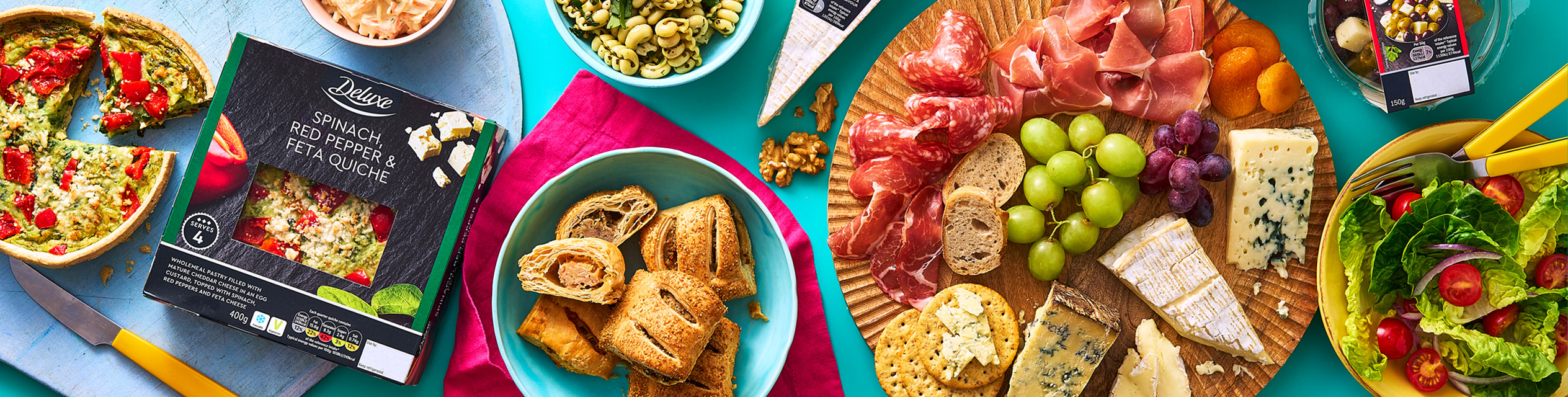 Spinach quiche, salami, cheeses and other treats.