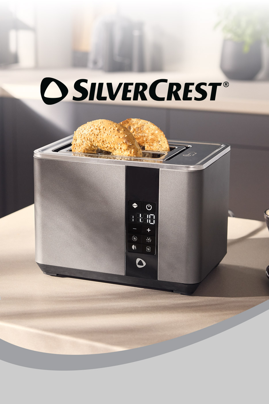 A modern stainless steel toaster with a digital display on a kitchen counter.
