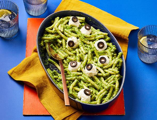 Pasta with pesto and cheese eyes
