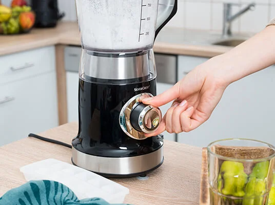 SilverCrest blender in use.