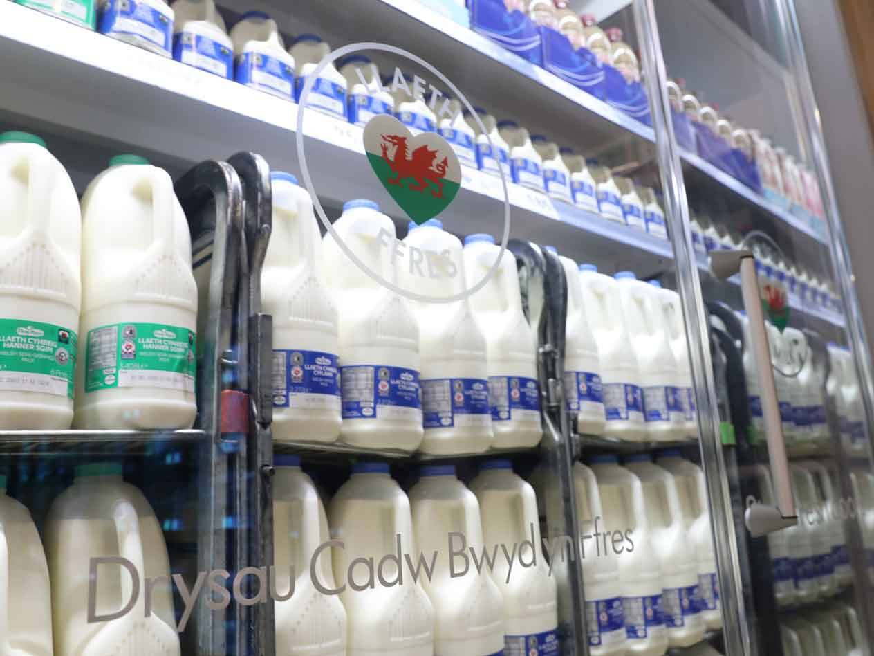 Llannerch milk bottles in a refrigerator.